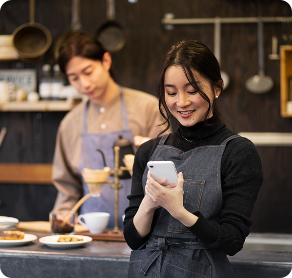 Woman ordering food on smartphone